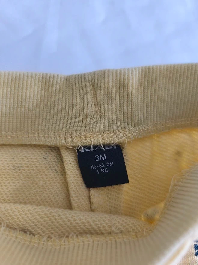 Short Kiabi 3 meses amarillo con estampado de flores y cintura elástica – photo 2